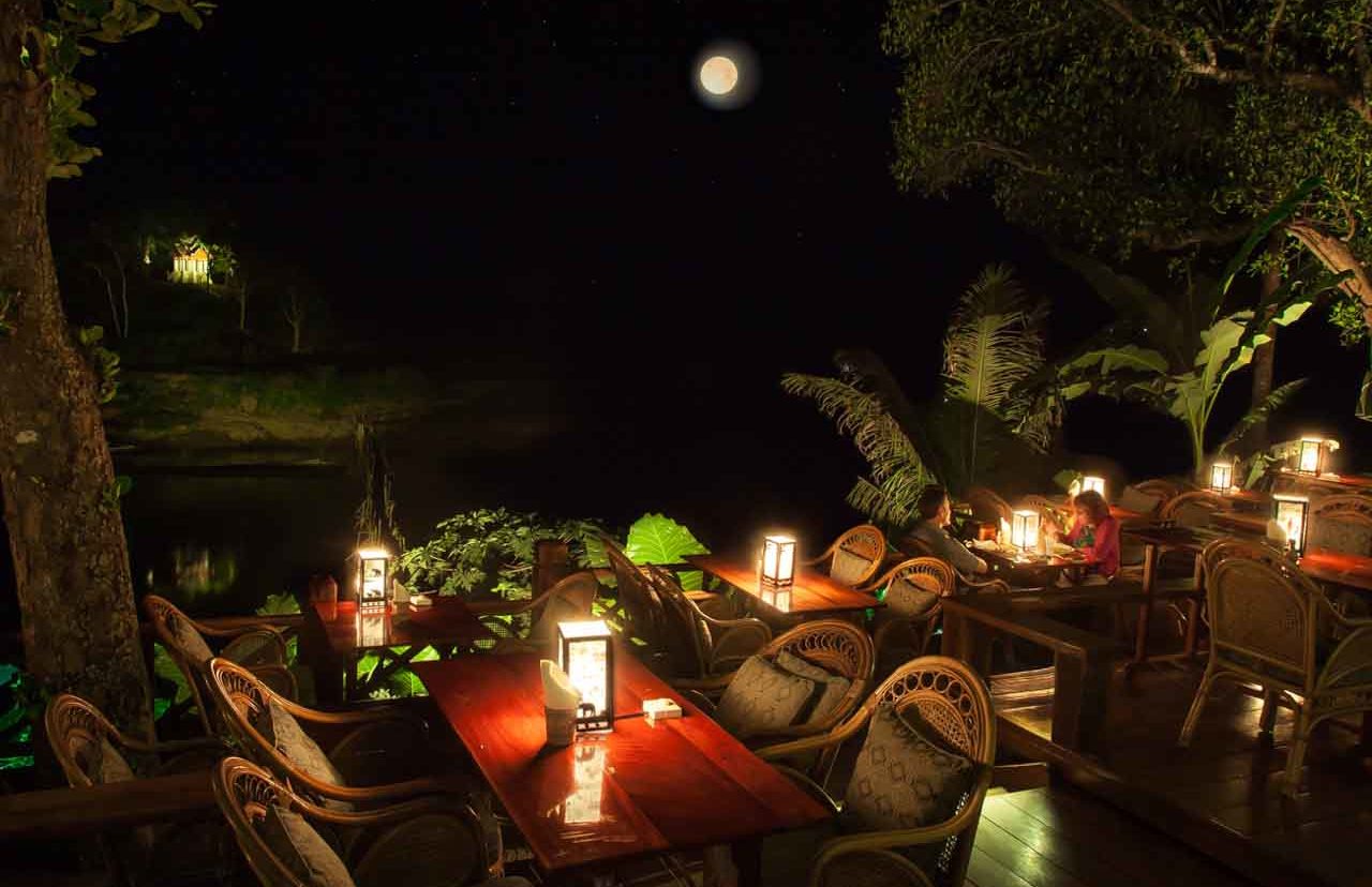 Viewpoint Restaurant by Mekong Riverview Hotel Luang Prabang, Laos, by night with full moon.