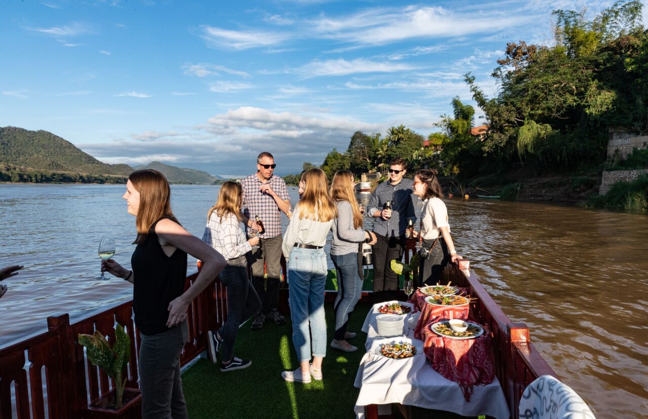 Romantic Sunset Cruise on the Mekong with the luxurious boat of Mekong Riverview Hotel Luang Prabang, Laos with the hotel guests.